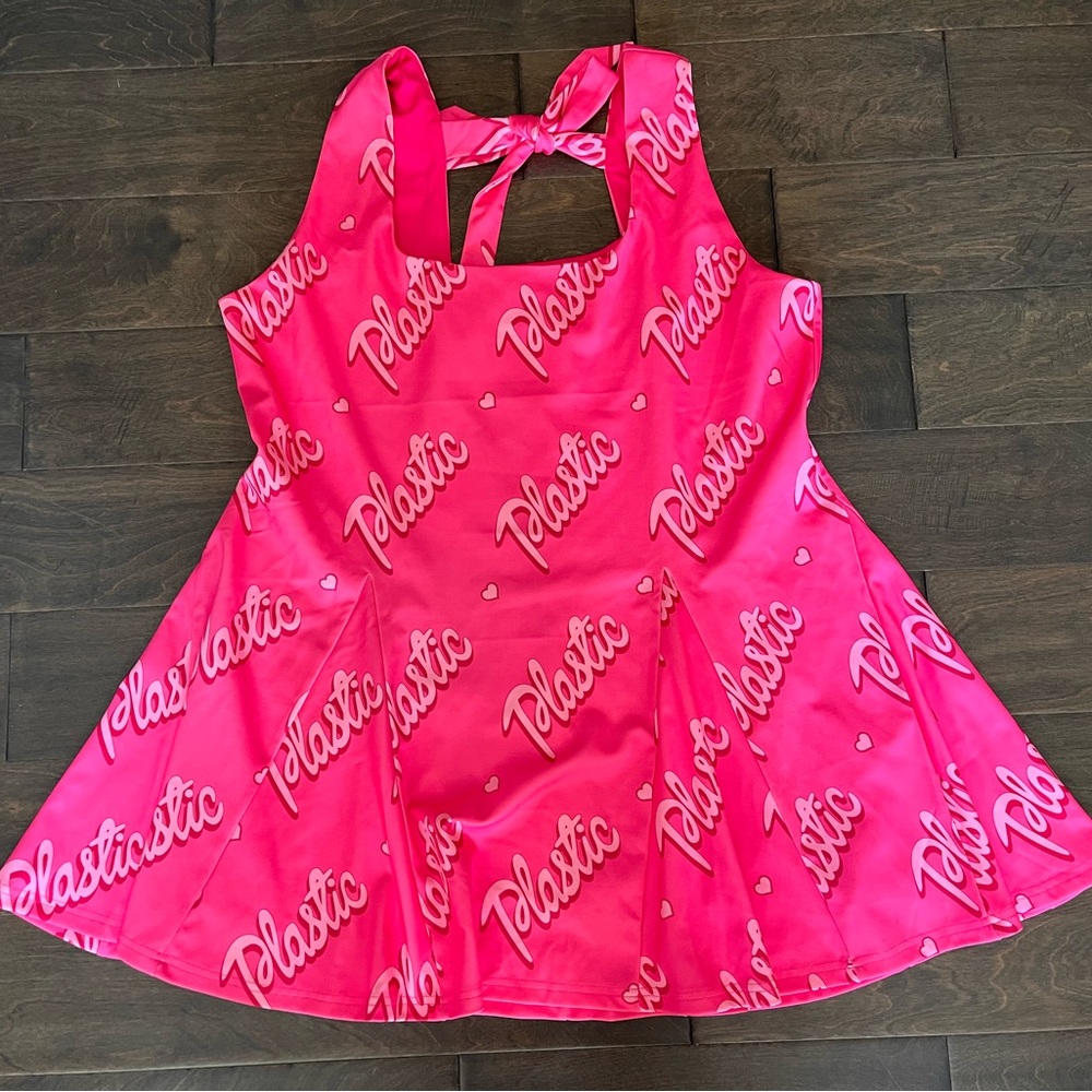 Sugar Thrillz “Life In Plastic” Pink Mini Dress with Bow Detail